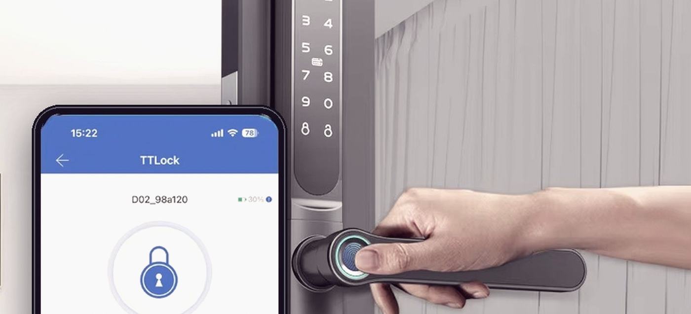 A smart lock showing its keypad, fingerprint reader and card area.